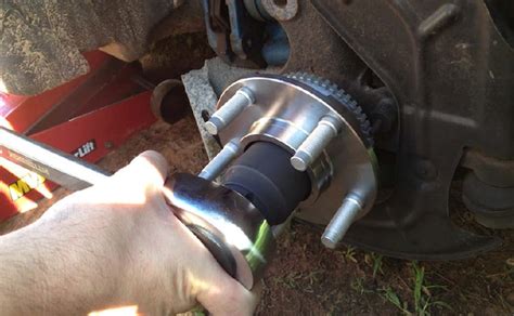 while turning wheel. . 2014 jeep compass rear axle nut torque